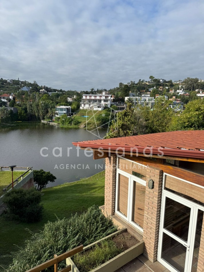 CARLOS PAZ| HERMOSA CASA SOBRE LA COSTA DEL RIO LOS CHORRILLOS